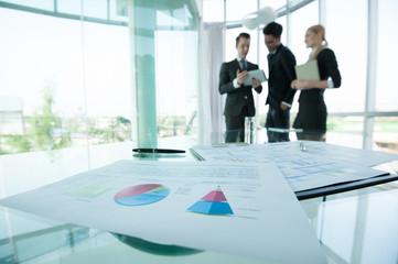 businessman and woman discussing in office