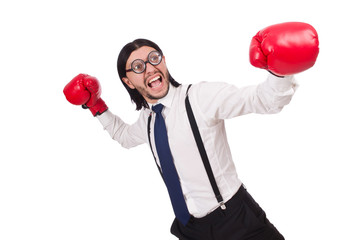 Funny young  businessman with boxing gloves isolated on white