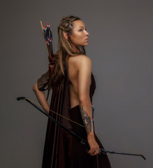 Elf woman with a bow.