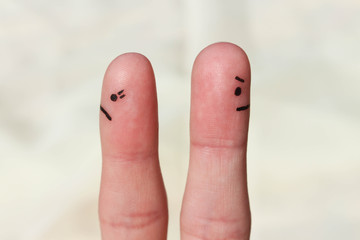 Couple after an argument look in different directions