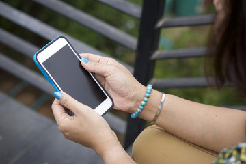Woman using smart phone