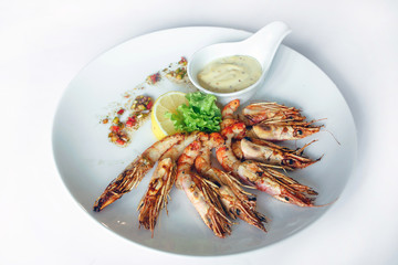 shrimp with sauce on a plate