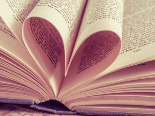 love heart in a book with filter effect retro vintage style