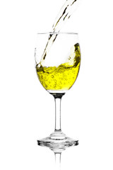 yellow water in wine glass. isolated on a white background