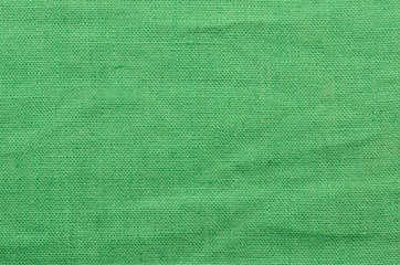 close up green linen cloth background