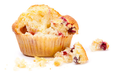 Cranberry muffin on a white background broken