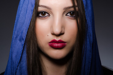 Portrait of the young woman with headscarf