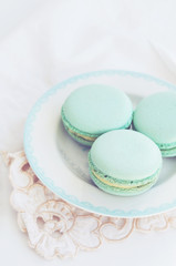 Pastel mint macaroon on light background