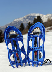 blue snowshoes in the mountain