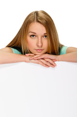 young woman with blank billboard