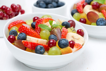 Fresh fruit and berry salad, close-up