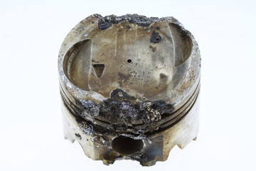 Piston damaged from high combustion ration or knock process.