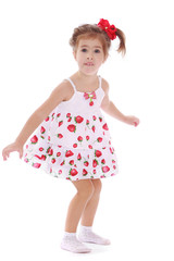 cheerful caucasian girl in a light summer dress.