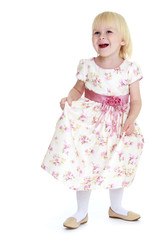 Cheerful caucasian blonde little girl.