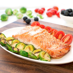 Piece of roasted salmon fillet with grilled vegetables. Square i