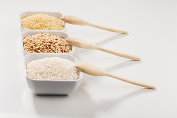 Row rice in three variation - white, integral and yellow