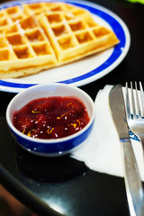 waffles with stawberry and caramel sauce