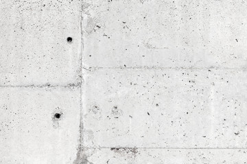 White concrete wall with details, background texture