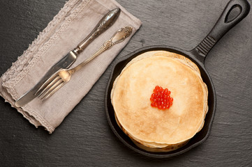 Pancakes with red caviar