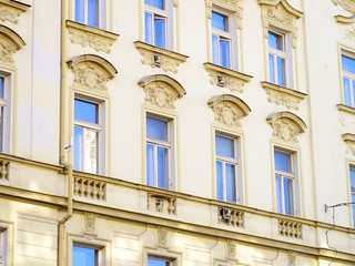 european apartment exterior facade detail, blue sky reflective w