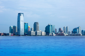 Fototapeta na wymiar New Jersey skyline from Hudson River NY USA