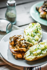 Grilled chicken with mushrooms and baked potatoes