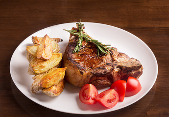 Grilled meat with vegetables and rosemary