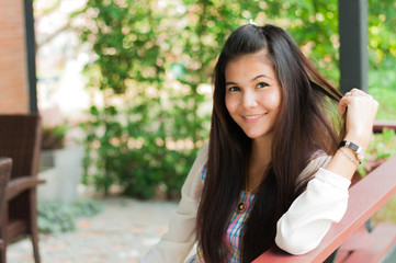 fashion indoor photo of beautiful smiling girl, relaxing time