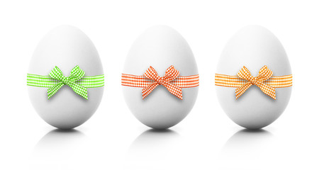 Drei Ostereier mit Schleife