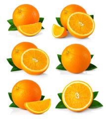 Set of ripe orange fruits with leaves and slices isolated