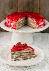 cake of chocolate crepes with curd cheese. selective focus