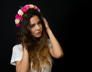 Portrait of beautiful young girl in diadem