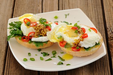 Food porn poached egg sandwiches with chili and scallion