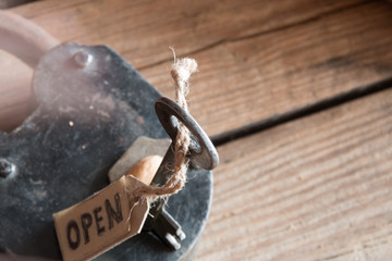 label open, old padlock and key