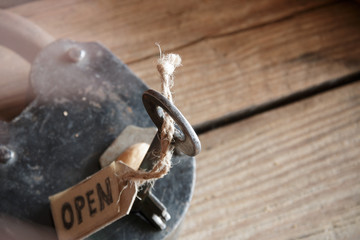 label open, old padlock and key