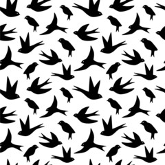 Seamless pattern made of swallow birds