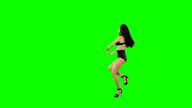 Go-go dancer girl isolated on green screen