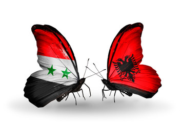 Two butterflies with flags Syria and Albania