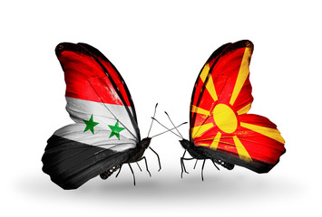 Two butterflies with flags Syria and Macedonia