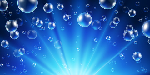 Abstract underwater background with sunlight and air bubbles