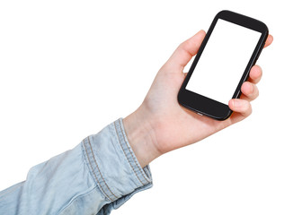 hand in shirt holds mobile phone isolated
