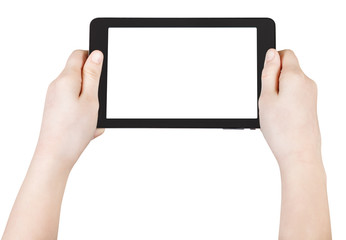 child's hands hold tablet pc isolated