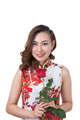 Chinese woman in cheongsam with rose.