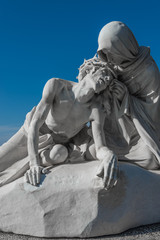 Naklejka premium Statue of Jesus Christ and Maria at church of Notre Dame de la G