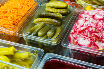Variety of pickled foods in a store