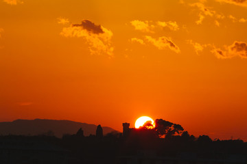 Fototapeta na wymiar Sunset with orange colors. Sun