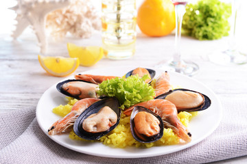 Seafood Paella on plate on table close-up