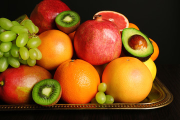 Assortment of fruits on table, close-up