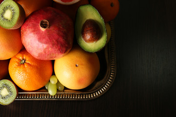 Assortment of fruits on table, close-up