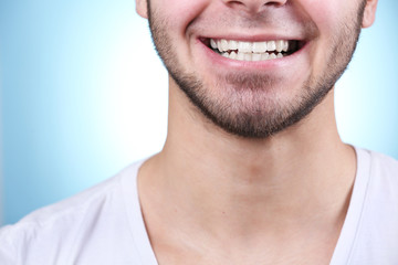 Fototapeta premium Smiling young man after visit dentist